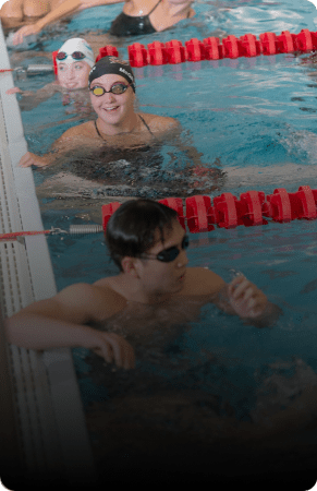 Swimmers in a pool during competition.